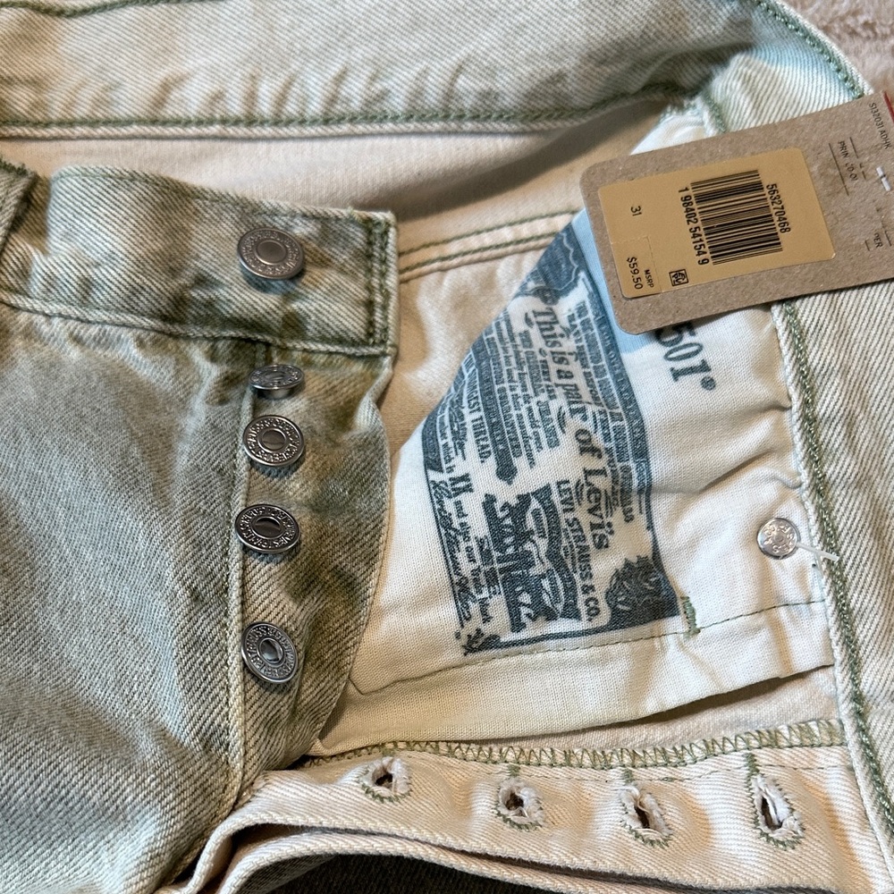 Levi's Women's 501 Original Blue Jean Shorts in a light wash. - Picture 6 of 9